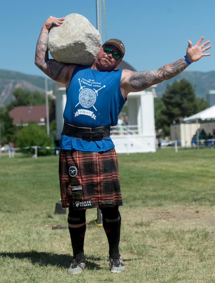 (Rick Egan  |  The Salt Lake Tribune)      Brian Huddleston, from Oklahoma City,  competes in the stone lifting competition at the 44th annual Utah Scottish Festival and Highland Games at the Utah State Fairgrounds, Sunday, June 10, 2018.