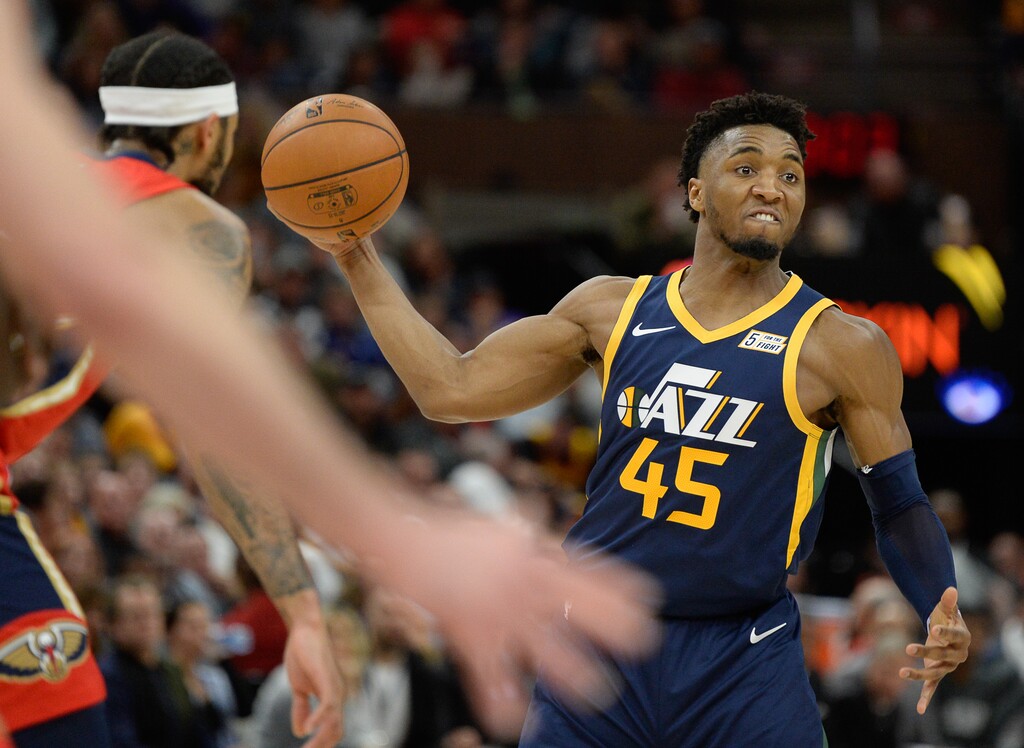 (Francisco Kjolseth | The Salt Lake Tribune) Utah Jazz guard Donovan Mitchell (45) passes the ball to a teammate as the Utah Jazz host the New Orleans Pelicans in their NBA basketball game at Vivint Smart Home Arena in Salt Lake City on Sat. Nov. 23, 2019.