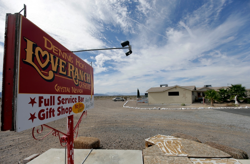 (Chris Carlson | The Associated Press) In this Oct. 14, 2015, file photo, a sign advertises the Love Ranch brothel in Crystal, Nev., where former NBA basketball player Lamar Odom was found unconscious the day before, after four days at the brothel. Dennis Hof, owner of the Love Ranch, is challenging incumbent James Oscarson for a seat in the Nevada State Assembly, Tuesday, Sept. 13, 2016.