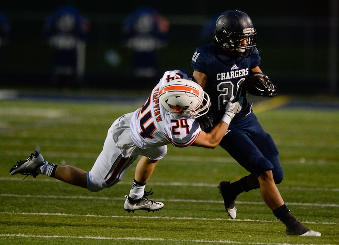 (Francisco Kjolseth  |  The Salt Lake Tribune) Chandler Sorenson of Timpview takes down Tai Gonzales of Corner Canyon in game action between Timpview at Corner Canyon on Thursday, Sept. 21, 2017.