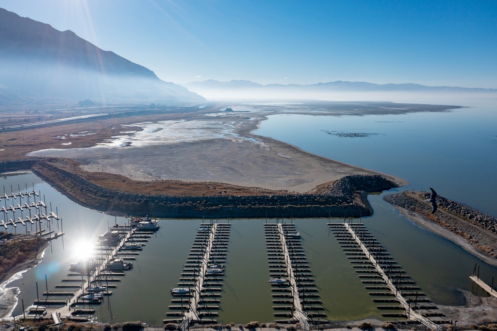 (Francisco Kjolseth | The Salt Lake Tribune) The Great Salt Lake marina is almost completely devoid of boats as persisting drought conditions continue to drop water levels and expose reef-like structures that resemble coral as seen on Tuesday, Dec. 7, 2021.