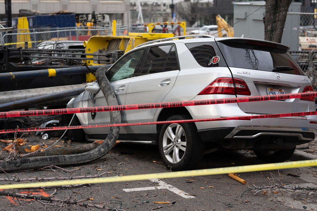 (Francisco Kjolseth | The Salt Lake Tribune) A collapsed drill rig is seen on Wednesday, March 16, 2022, at the intersection of State Street and 200 South. The rig toppled over Tuesday night at the site of the new Astra Tower, crushing two unoccupied parked cars and sending the crane operator to the hospital in serious condition.