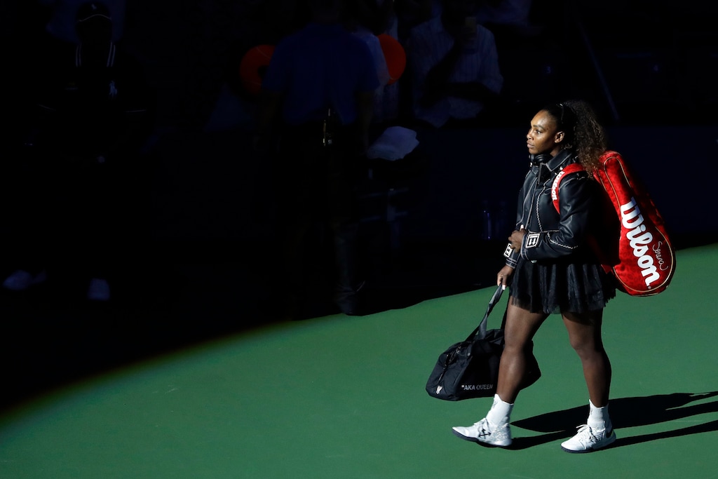 (Jason DeCrow | The Associated Press) Serena Williams, of the United States, walks onto the court before her match against Magda Linette, of Poland, during the first round of the U.S. Open tennis tournament, Monday, Aug. 27, 2018, in New York.