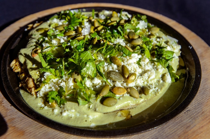 (Steve Griffin | The Salt Lake Tribune) The chicken enchiladas with green chile & pumpkin seed salsa (Pollo Con Pipian Verde) at Alamexo Cantina in Salt Lake City .
