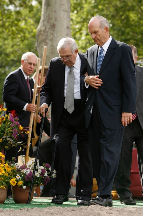 Leah Hogsten  |  The Salt Lake TribunePresident Boyd K. Packer, left, gets a hand walking from Elder Russell M. Nelson, right, during the groundbreaking for a new LDS temple in Brigham City, Utah, on July 31, 2010.