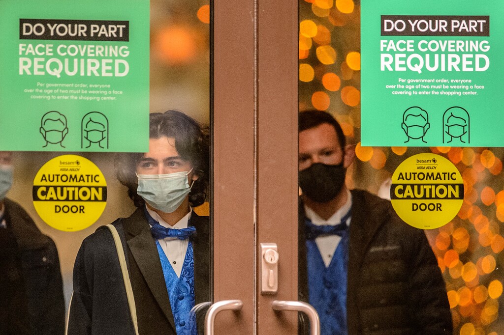 (Trent Nelson  |  The Salt Lake Tribune) Masks are a common sight in Salt Lake City on Friday, Dec. 11, 2020. The Utah Department of Health on Friday reported a seven-day average of 2,702 new positive test results per day — below last week’s rate of nearly 3,000.
