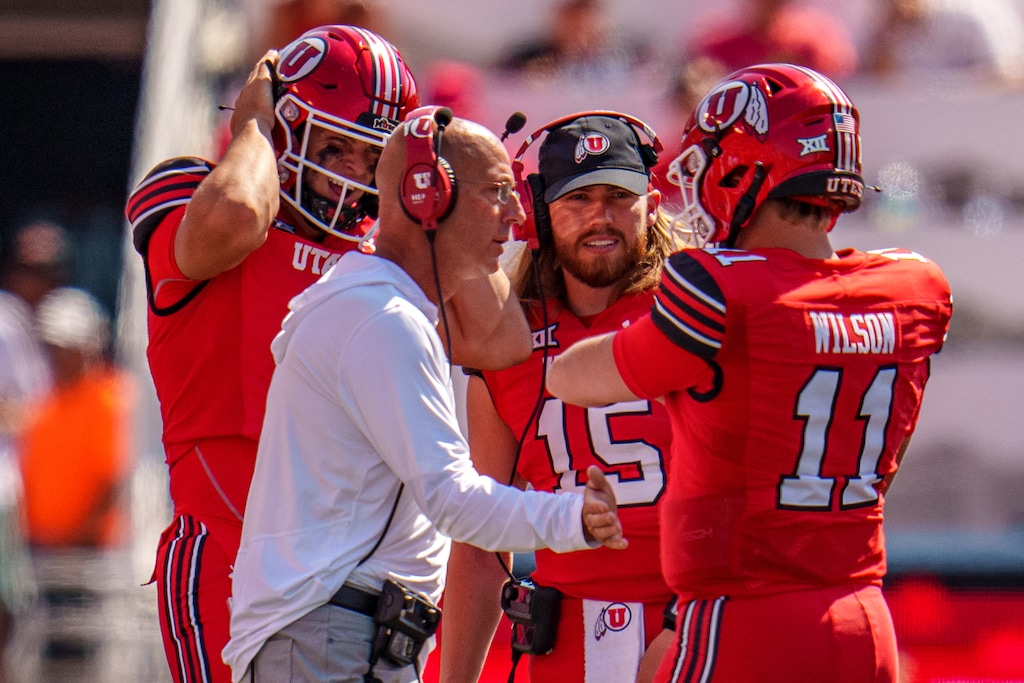 (Trent Nelson  |  The Salt Lake Tribune) Mike Bajakian, Utah Utes quarterback Luke Bottari (15), Utah Utes quarterback Isaac Wilson (11) as the Utah Utes host the Baylor Bears, NCAA football in Salt Lake City on Saturday, Sept. 7, 2024.