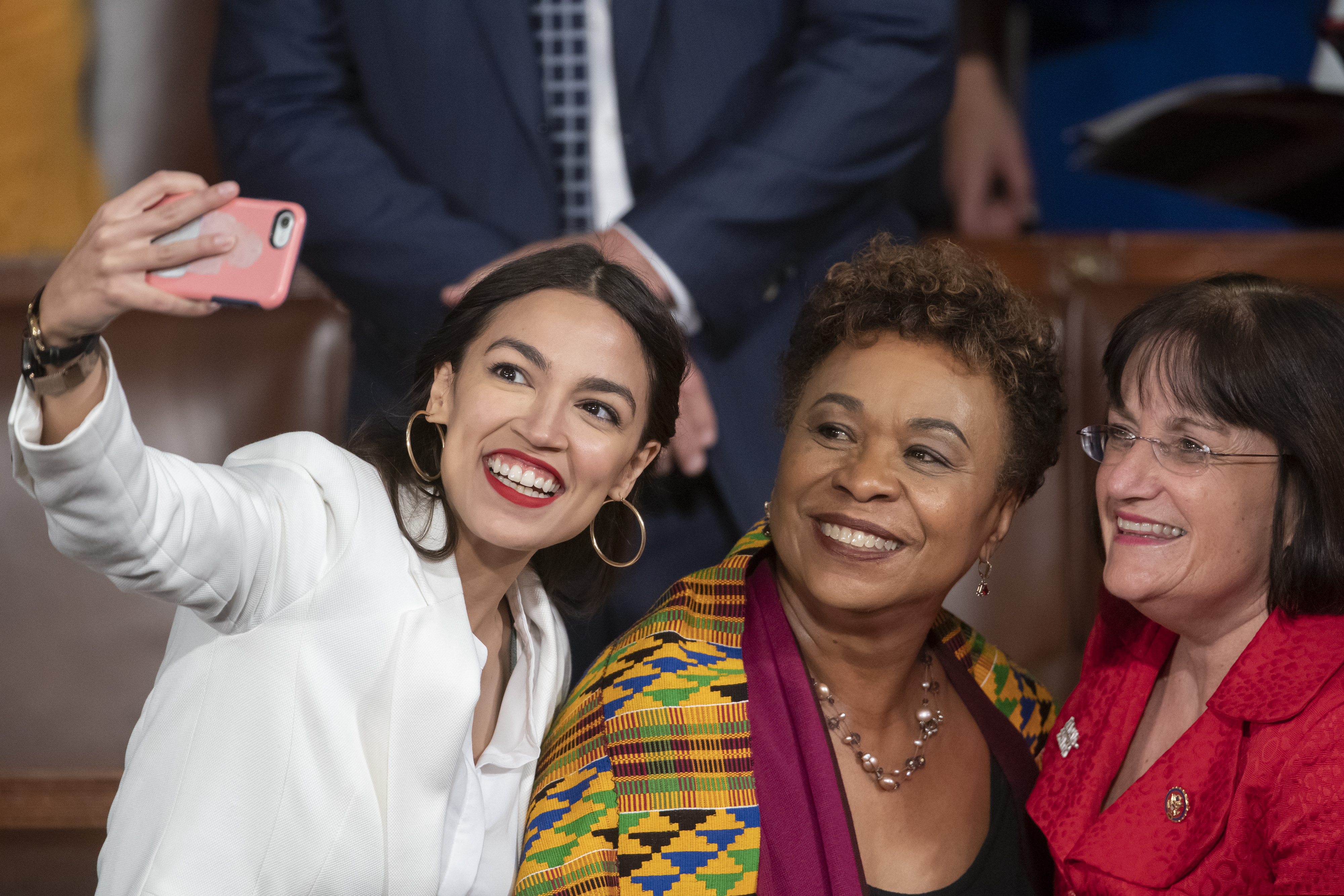 Rep.-elect Alexandria Ocasio-Cortez, a freshman Democrat representing New York's 14th Congressional District, takes a selfie with Rep. Ann McLane Kuster, D-NH, and Rep. Barbara Lee, D-Calif., on the first day of the 116th Congress with Democrats holding the majority, at the Capitol in Washington, Thursday, Jan. 3, 2019. (AP Photo/J. Scott Applewhite)