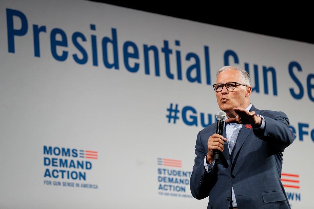 FILE - In this Aug. 10, 2019 file photo, Democratic presidential candidate Washington Gov. Jay Inslee speaks at the Presidential Gun Sense Forum in Des Moines, Iowa. Inslee, who made fighting climate change the central theme of his presidential campaign, announced Wednesday night, Aug. 21, 2019, that he is ending his bid for the 2020 Democratic nomination. (AP Photo/Charlie Neibergall, File)