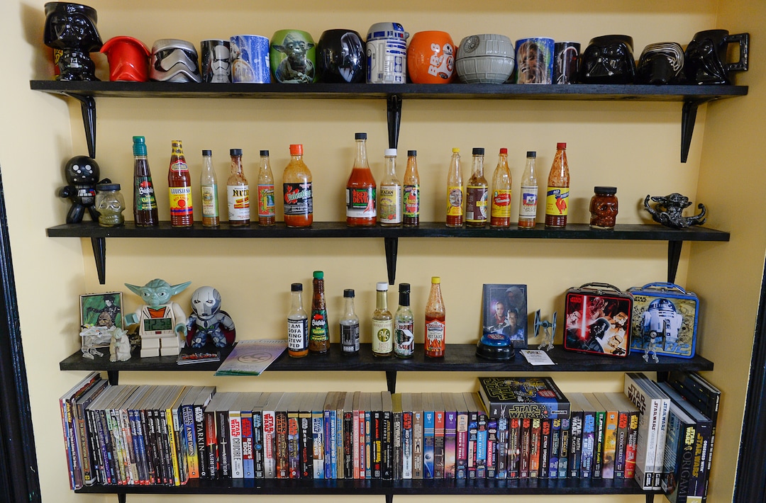 (Francisco Kjolseth  |  The Salt Lake Tribune) This  unique shelf display at the The Twin Suns Cafe, represents its "Star Wars" theme and a menu with Southwest flavors.