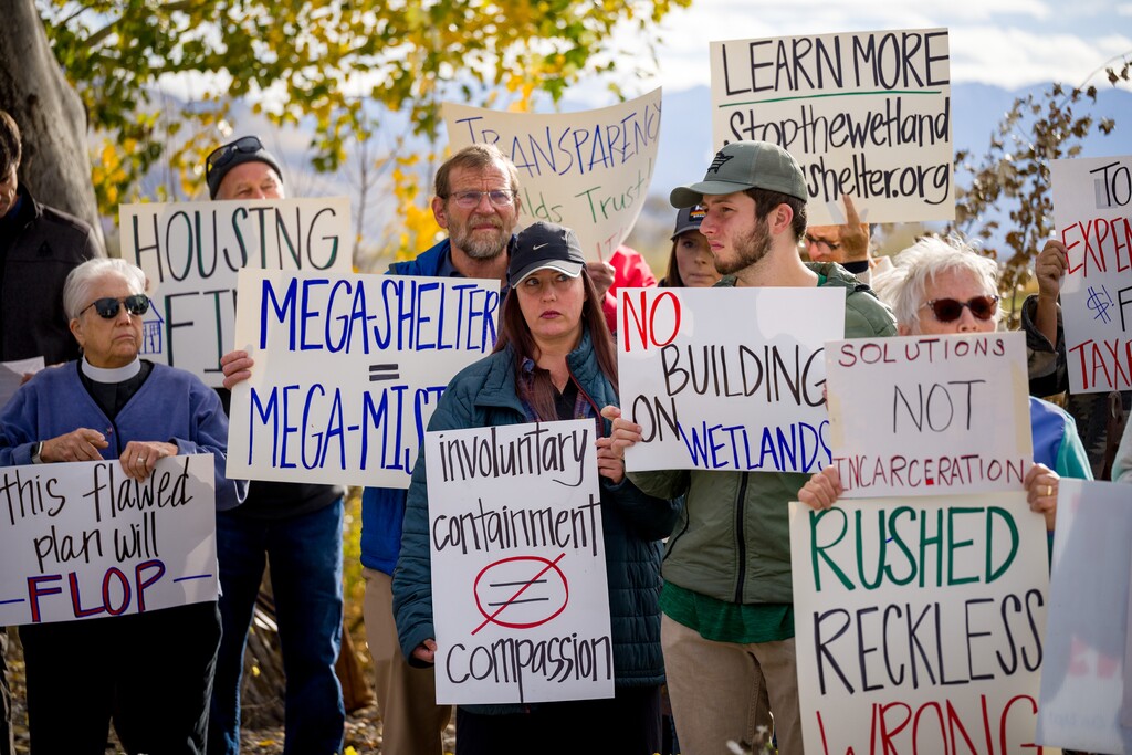 (Trent Nelson  |  The Salt Lake Tribune) People at a news conference near the site of the proposed homeless campus in Salt Lake City on Tuesday, Nov. 18, 2025.