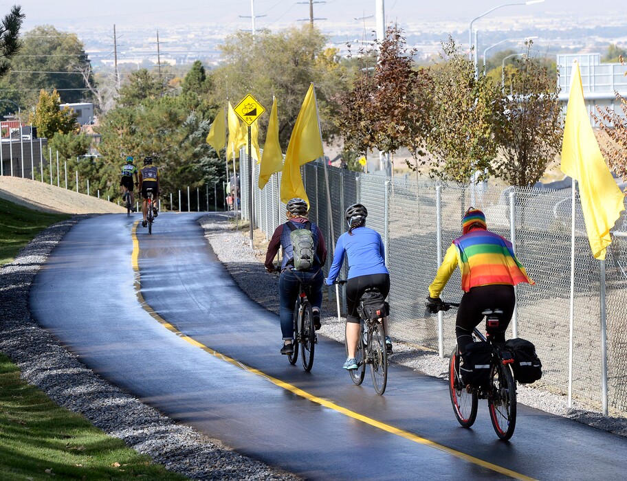 (Al Hartmann | Tribune file photo)
In this Oct. 17, 2017, file photo, bike riders take their first tour down a long section of Parley’s Trail from Tanner Park towards Sugar House Park. The trail stays above and parallels I-80 and uses bridges to get to Sugar House Park.