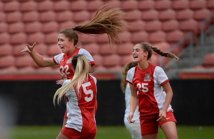 (Scott Sommerdorf   |  The Salt Lake Tribune)   American Fork's Jamie Shepherd, #22, jumps as she celebrates with team mates after her goal put the Cavemen ahead at 2-1. American Fork beat Syracuse 3-1 to win the 6A championship game played at Rio Tinto, Friday, October 20, 2017. 