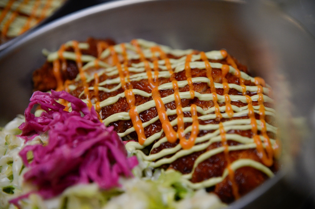 (Francisco Kjolseth  |  The Salt Lake Tribune)  Chicken Katsu with pancro crusted fried chicken served with house katsu sauce and avocado/cilantro aioli at the Angry Korean fusion restaurant. Originally started with a food truck, they now have a sit-down restaurant in South Jordan.