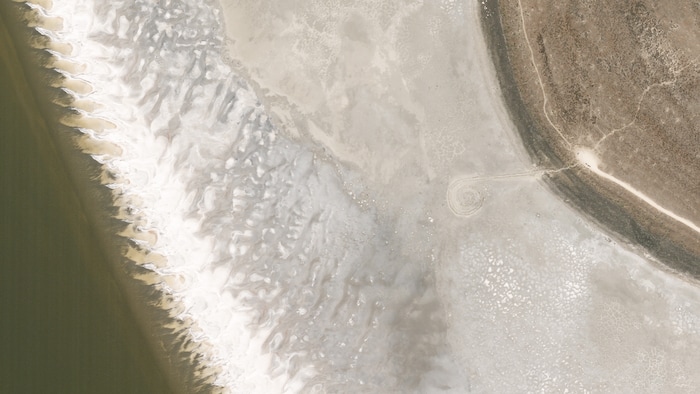 (Planet) A satellite image of the Spiral Jetty, in the north end of the Great Salt Lake, taken on June 22, 2021.