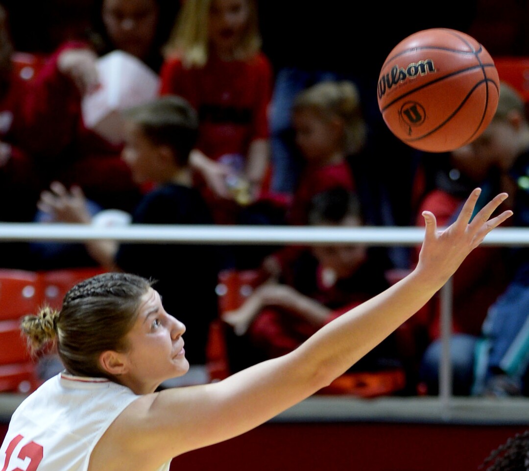 Steve Griffin / The Salt Lake TribuneUtah Utes forward Emily Potter (12) stretches for the ball during Pac-12 game against Arizona at the Huntsman Center in Salt Lake City Sunday January 8, 2017. 