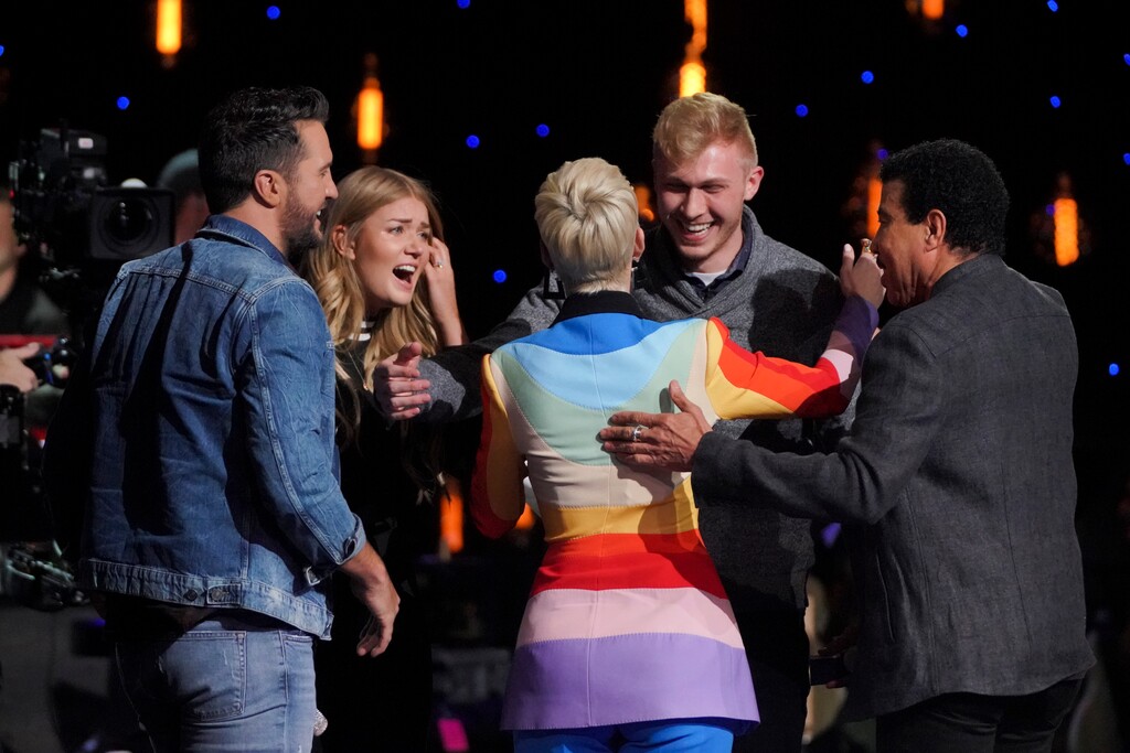 (Photo courtesy Eric McCandless/ABC) BYU students Johanna Jones (second from left) and Matt Zavoral (second from right) are congratulated by judges Luke Bryan (left), Katy Perry and Lionel Richie after they got engaged on Monday's episode of “American Idol.”