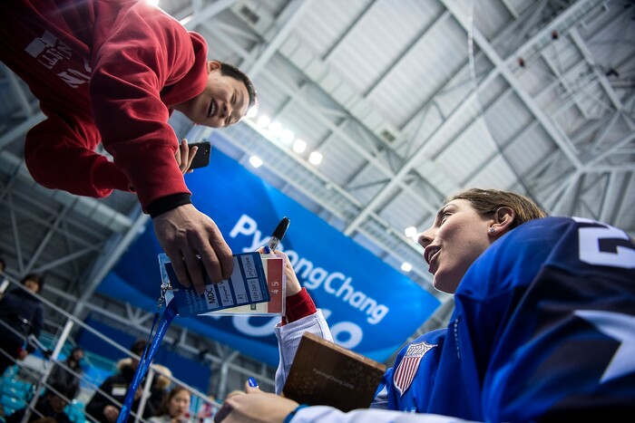 (Chris Detrick  |  The Salt Lake Tribune) United States forward Hilary Knight (21) signs an autograph for a fan after winning the Women's Gold Medal Game at Gangneung Hockey Centre during the Pyeongchang 2018 Winter Olympics Thursday, Feb. 22, 2018. United States defeated Canada 3-2 in a shootout victory. 