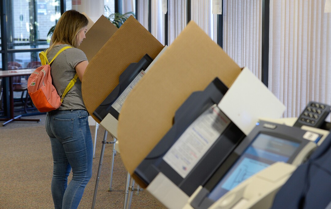 (Francisco Kjolseth  |  The Salt Lake Tribune)  People arrive to vote early at the Salt Lake County complex for primary election day on Tuesday, June 26, 2018.