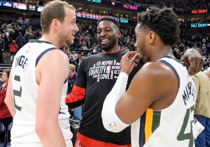 (Leah Hogsten  |  The Salt Lake Tribune) Utah Jazz guard Joe Ingles (2) and Utah Jazz guard Donovan Mitchell (45) share a laugh with their former teammate Houston Rockets forward Jeff Green (32).  The Utah Jazz lost to the Houston Rockets 110-120 at Vivint Arena, Feb. 22, 2020.
