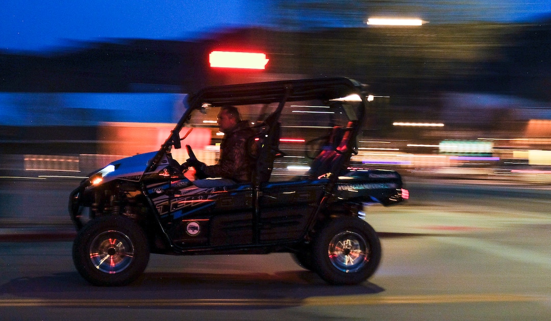 (Leah Hogsten | The Salt Lake Tribune) An off-road utility terrain vehicle (UTV) motors down 100 South in downtown Moab, Feb. 19, 2021.