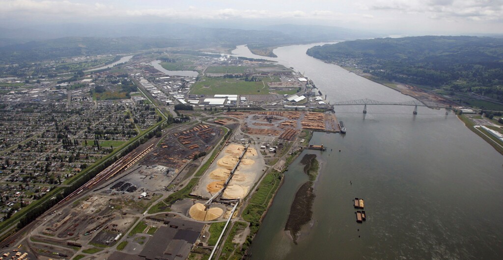 (Elaine Thompson | The Associated Press) In this May 12, 2005, file photo, the Port of Longview is visible on the Columbia River at Longview, Wash. Republican lawmakers from Western states and industry executives on Thursday, May 31, 2018, accused Washington state officials of unfairly blocking fossil fuel projects and dictating winners and losers among U.S. companies seeking to export products to Asia.
