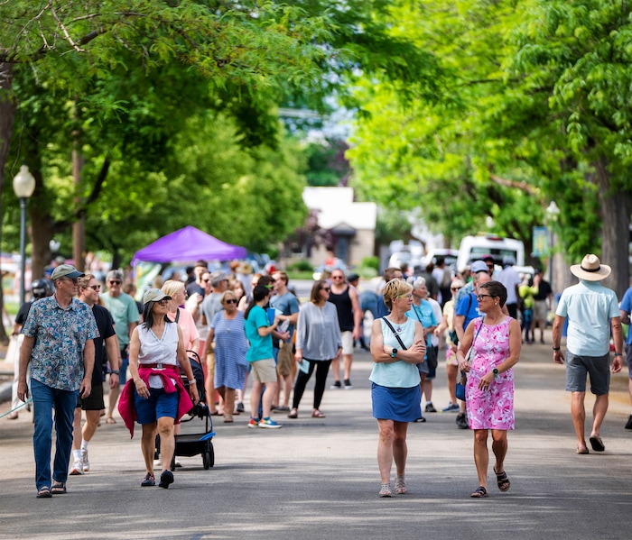 (Rick Egan | The Salt Lake Tribune)  Crowds walk down Filmore Avenue during the Heart & Soul Music Stroll, in Sugar House, on Saturday, June 10, 2023.
