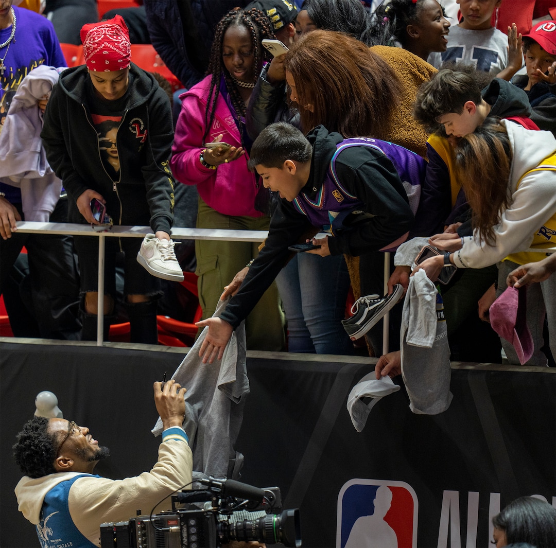 (Rick Egan | The Salt Lake Tribune) Donovan Mitchell signs autographs during the HBCU game at the Jon M. Huntsman Center on Saturday, Feb. 18, 2023.