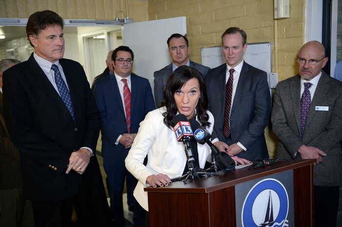 (Al Hartmann | The Salt Lake Tribune)
Rachel Santizo speaks at opening of a new Odyssey House 83-bed treatment facility on Thursday, Jan. 11 at 3944 S. 400 E. in Millcreek. Bend from left: Rep. James Dunnigan, CEO of Odyssey House Adam Cohen, Speaker of the House Greg Hughes, Salt Lake County Mayor Ben McAdams and Milcreek Mayor Jeff Silvestrini.