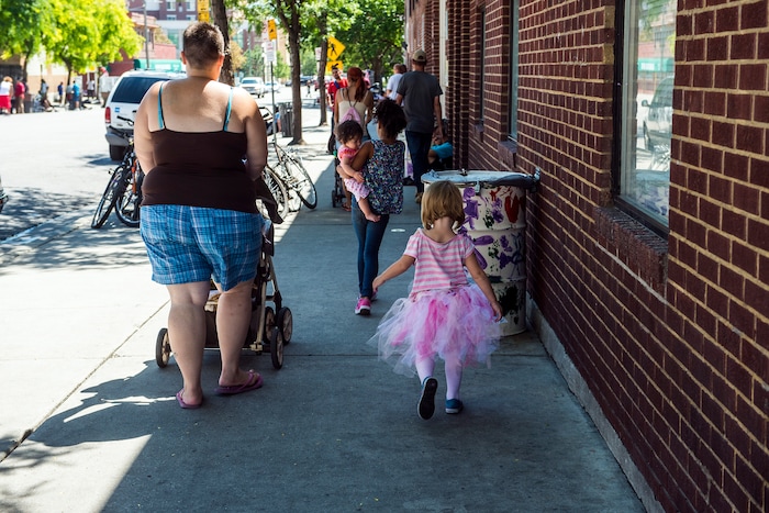 Chris Detrick  |  The Salt Lake Tribune
Melisha Spooner and her daughter Saphira, 3, walk to The Road Home in Salt Lake City Tuesday August 4, 2015. 