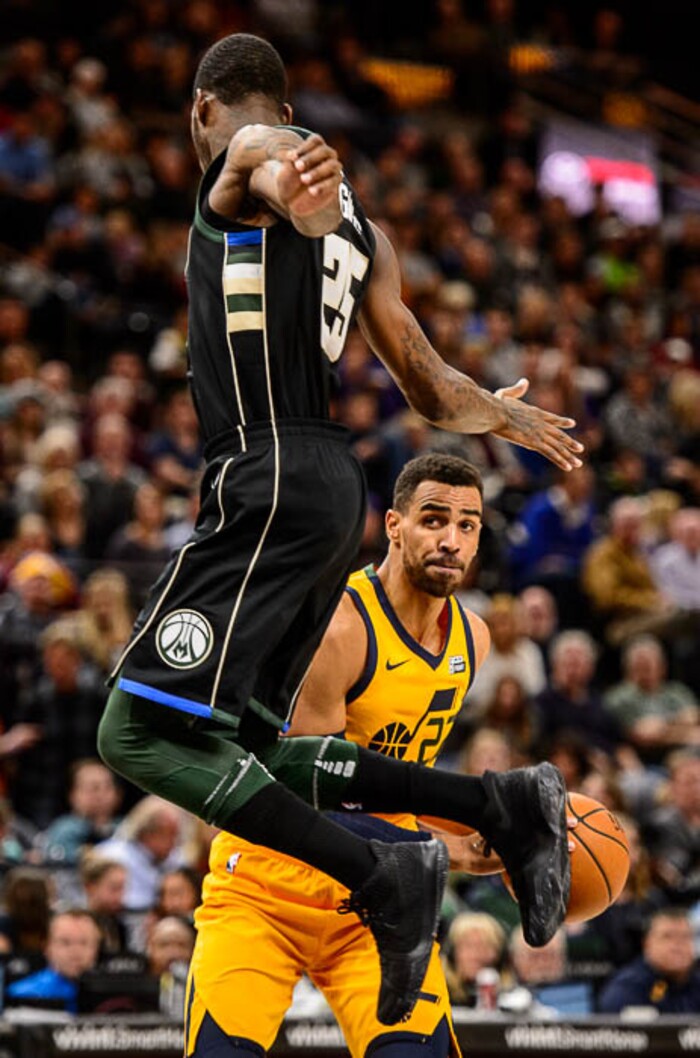(Trent Nelson | The Salt Lake Tribune)  Utah Jazz forward Thabo Sefolosha (22) defended by Milwaukee Bucks guard DeAndre Liggins (25) as the Utah Jazz host the Milwaukee Bucks, NBA basketball in Salt Lake City Saturday November 25, 2017.