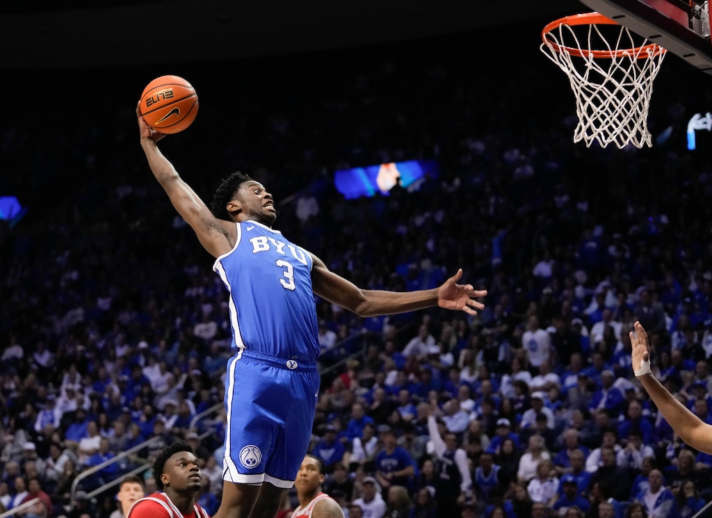 (Francisco Kjolseth | The Salt Lake Tribune) BYU Cougars forward AJ Dybantsa (3) makes a dunk as BYU hosts Utah, NCAA basketball in Provo on Saturday, Jan. 24, 2026.