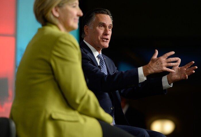 (Francisco Kjolseth  |  The Salt Lake Tribune)  Natalie Gochnour, Associate Dean and Director of the Kem C. Gardner Policy Institute is joined by Mitt Romney as he speaks at the Utah Economic Outlook & Policy Summit 2018, hosted by the Salt Lake Chamber at the Salt Lake City Marriott Downtown at City Creek on Tuesday, Jan. 16, 2018. 
