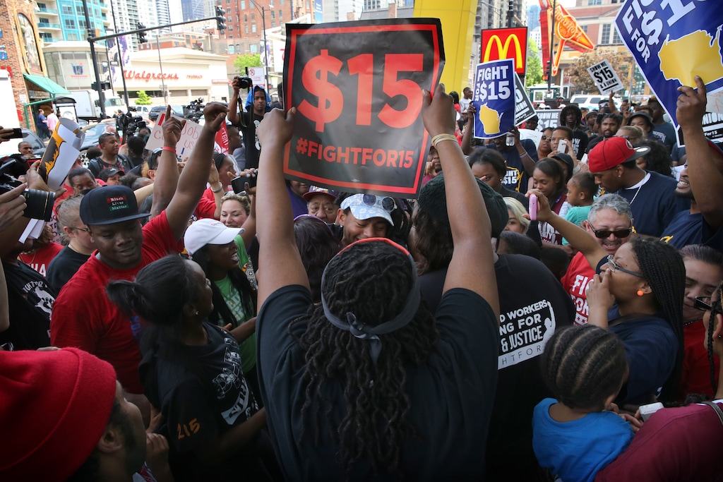 (Antonio Perez | Chicago Tribune via AP)

Protesters rally outside a McDonald's in Chicago to demand $15 per hour pay, Wednesday, May 25, 2016 in Chicago.