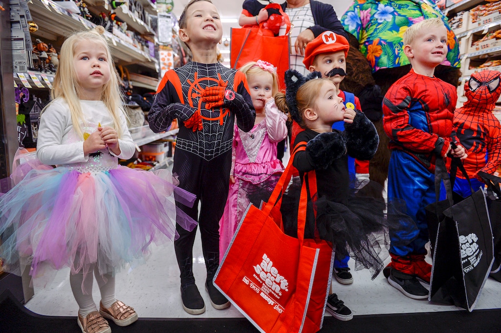 (Leah Hogsten | Tribune file photo) Utah First Lady Jeanette Herbert handed out reflective totes to children in their Halloween costumes at Maceys grocery store and lead them around the store for trick or treating, Oct. 24, 2019 to ramp up child safety awareness this Halloween.