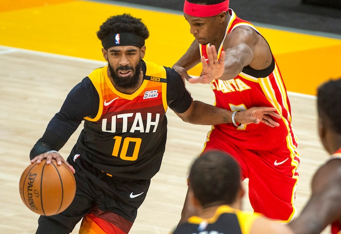 (Rick Egan | The Salt Lake Tribune) Utah Jazz guard Mike Conley (10) takes the ball up the middle, in NBA action between the Utah Jazz and the Atlanta Hawks at Vivint Arena, on Friday, Jan. 15, 2021.,