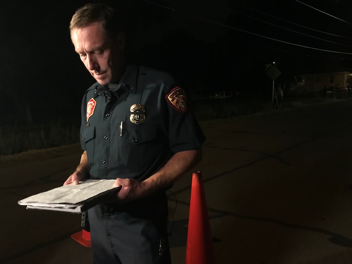 (Paighten Harkins | The Salt Lake Tribune) Unified Fire Capt. Jay Torgersen reads a statement from Draper Fire Battalion Chief Matt Burchett's family on Wednesday, Aug. 15, 2018, in South Jordan.