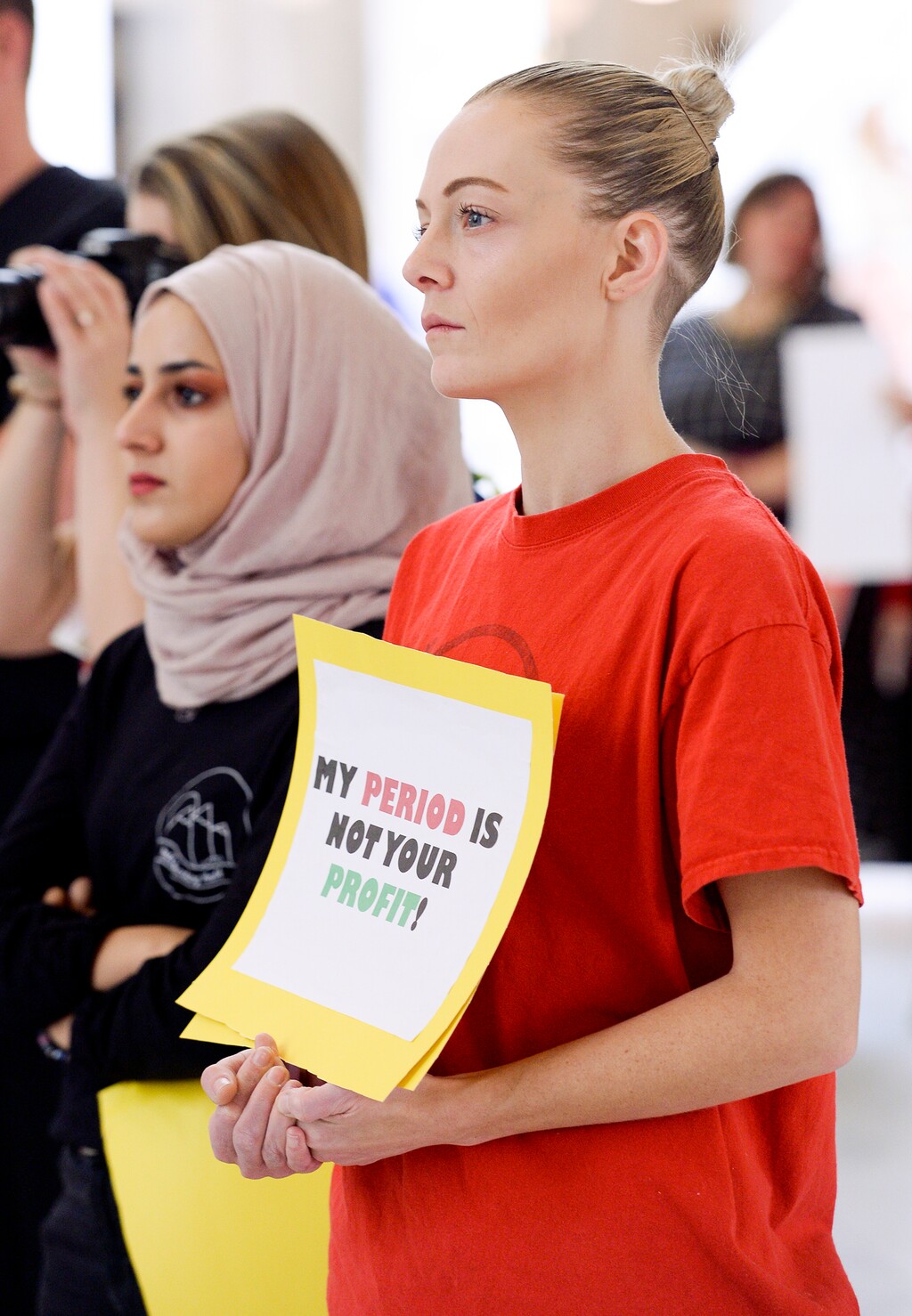 (Leah Hogsten  |  Tribune file photo) Daphne Nelson rallies with others in an effort to end the sales tax on women menstrual products at the Salt Lake City Capitol on October 16, 2019.