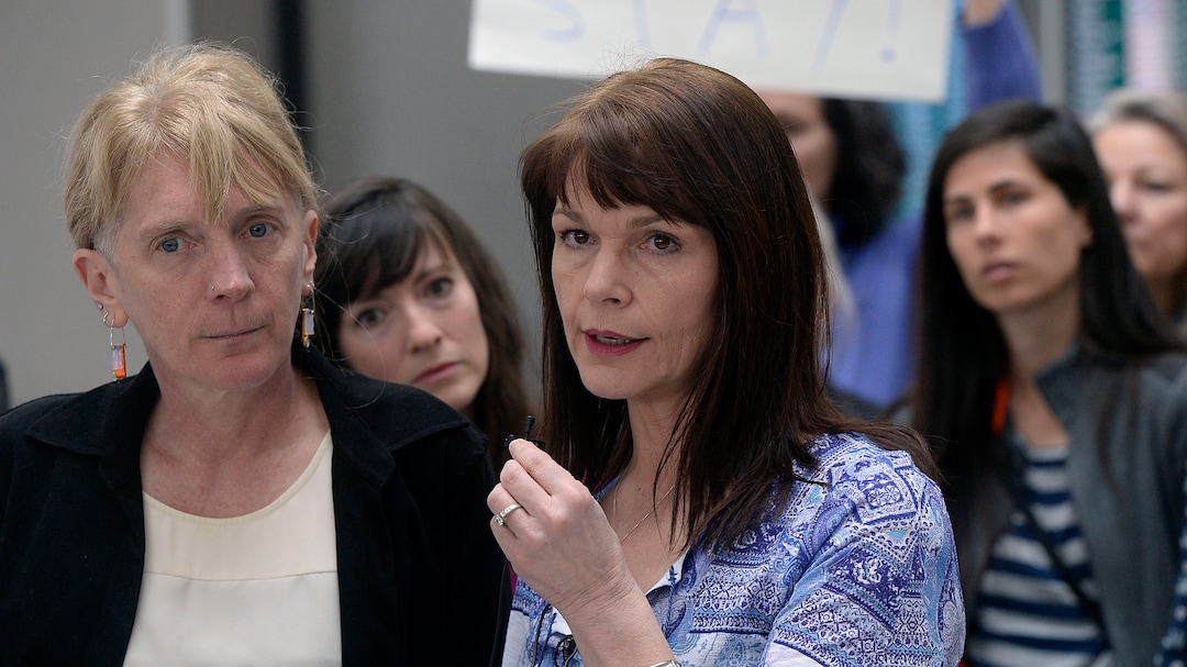 (Al Hartmann  |  The Salt Lake Tribune)  Judi Hilman with Salt Lake Indivisible, left, and Sharlee Glenn with Mormon Women for Ethical Government gathered with Mormon women and other concerned citizens at the Salt Lake City Airport in a show of solidarity for an area woman, Isabel, who has been ordered to leave the United States by ICE agents. 
ICE  escorted her onto a flight bound for Columbia. Isabel is a single mother and is the sole caretaker for her disabled son and her 86-year-old mother.