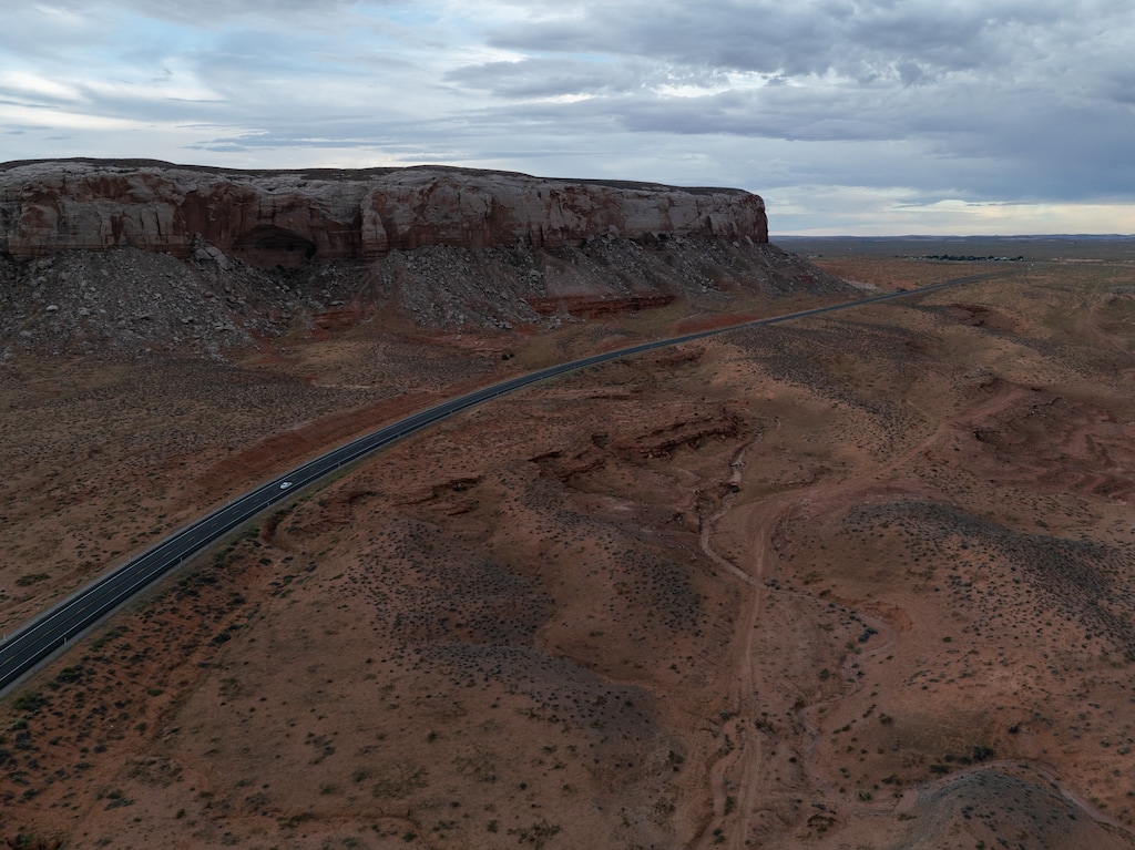 (Trevor Christensen | The Salt Lake Tribune) U.S. Highway 191 heading north through the Navajo Nation on Tuesday, Aug. 13, 2024. Energy Fuels drove two truckloads of uranium ore across Navajo land in July, prompting pushback from tribal leadership. The company and the tribe reached a deal for uranium transport to resume on Wednesday.