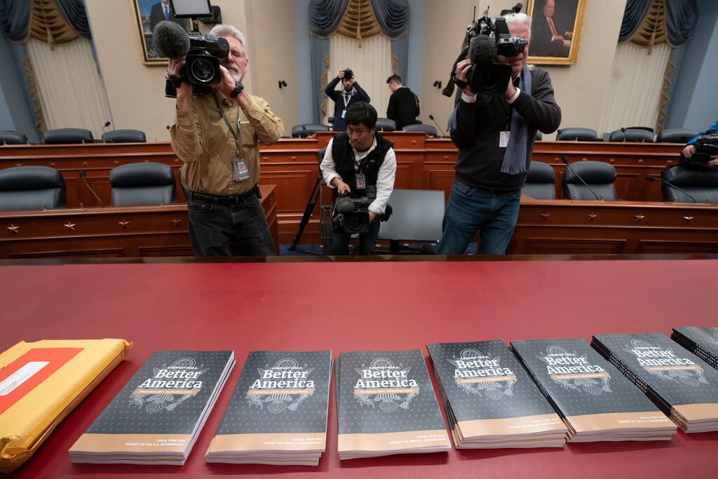 (J. Scott Applewhite | The Associated Press) President Donald Trump's 2020 budget outline arrives on Capitol Hill at the House Budget Committee, in Washington, Monday morning March 11, 2019. Trump's new budget calls for billions more for his border wall, with steep cuts in domestic programs but increases for military spending.
