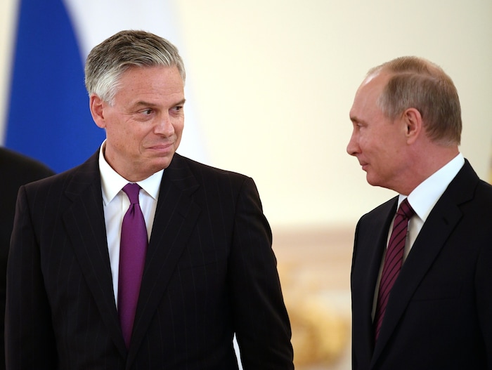 3204861 10/03/2017 October 3, 2017. Russian President Vladimir Putin and Ambassador Extraordinary and Plenipotentiary of the United States to Russia Jon Meade Huntsman, left, at the ceremony to present credentials of foreign ambassadors. The Grand Kremlin Palace's Alexander Hall. Evgeny Biyatov/Sputnik  via AP