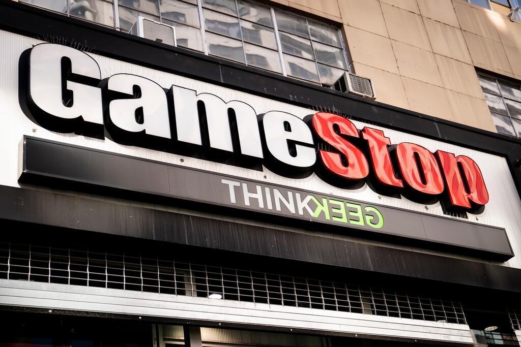 FILE - Pedestrians pass a GameStop store on 14th Street at Union Square, Thursday, Jan. 28, 2021, in the Manhattan borough of New York. Followers of YouTube personality Roaring Kitty, inspired by his enthusiasm for buying stock in the underdog retailer GameStop, made him an icon in the social media frenzy that shocked Wall Street. But what’s been a big victory for 34-year-old Keith Gill could lead to heartbreak and hardship for followers who jumped on the bandwagon and took risky bets on GameStop’s rollercoaster ride in the stock market. (AP Photo/John Minchillo, File)