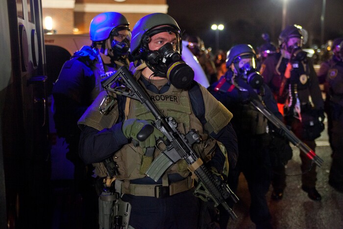 (Autumn Lin | Magnolia Pictures) Riot police mobilize in Ferguson, Mo., in a moment captured in the documentary "Whose Streets?"