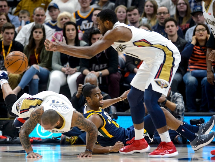 (Steve Griffin  |  The Salt Lake Tribune) Utah Jazz guard Alec Burks (10) crashes to the floor during a scramble for the ball during the the Utah Jazz versus the New Orleans Pelicans NBA basketball game at the Vivint Smart Home Arena in Salt Lake City Wednesday January 3, 2018.