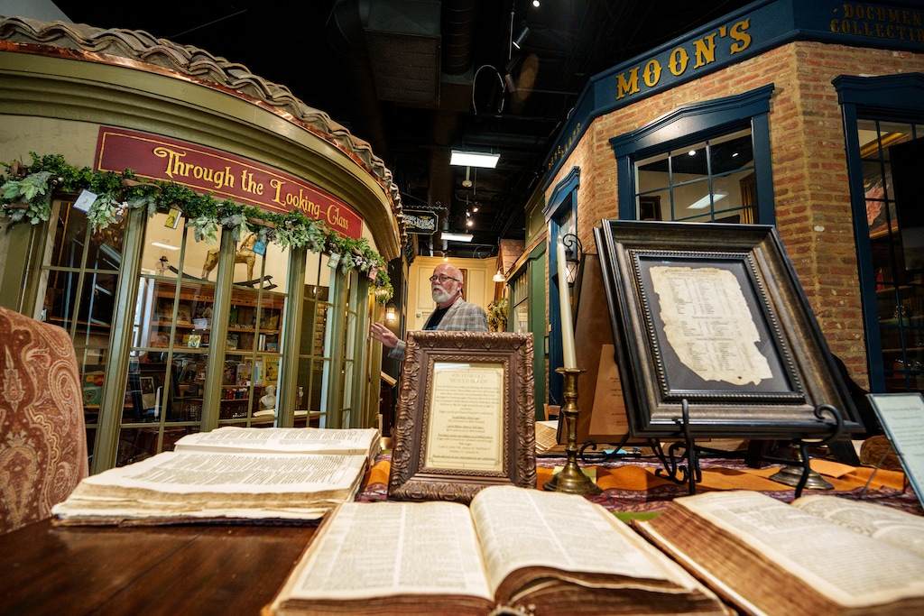 (Trent Nelson | The Salt Lake Tribune) Reid Moon gives a tour of Moon's Rare Books in Provo on Tuesday, July 16, 2024. The store, nestled in The Shops at Riverwoods, contains some 5,000 items — all curated by Moon himself, and often with a fascinating story to go with each one.