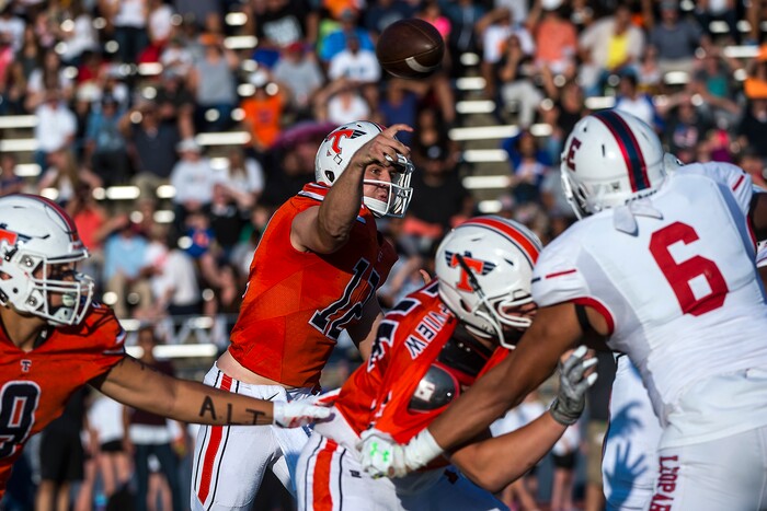 (Chris Detrick  |  The Salt Lake Tribune)  Timpview's Isiah Ramos (12) passes the ball during the game at Timpview High School Thursday, August 17, 2017. 