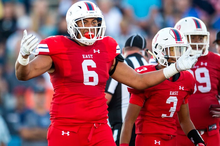 (Chris Detrick  |  The Salt Lake Tribune)  East's Johnson Hansen (6) celebrates after sacking Bingham's Ryan Wood (2) during the game at Bingham High School Friday, August 25, 2017. Bingham is winning the game 24-17 at halftime. 