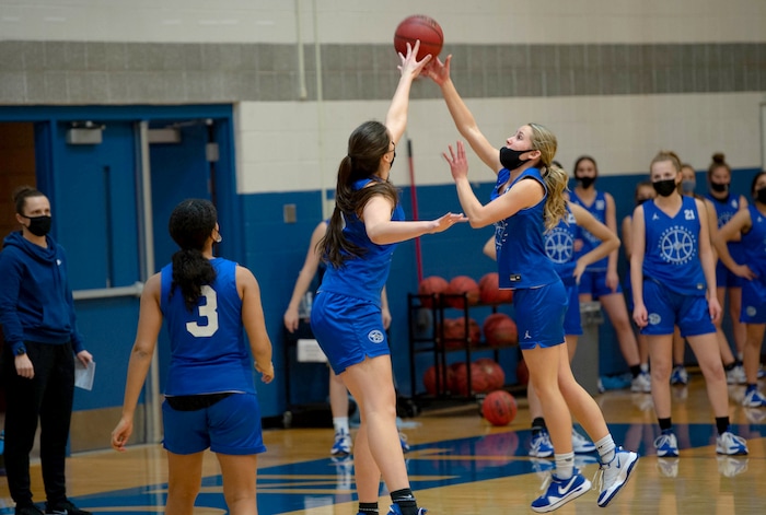 (Francisco Kjolseth  | The Salt Lake Tribune) Emma Calvert, left, defends against Ashley Oliver as the Fremont girls basketball teams runs through drills on Wednesday, Feb. 24, 2021.