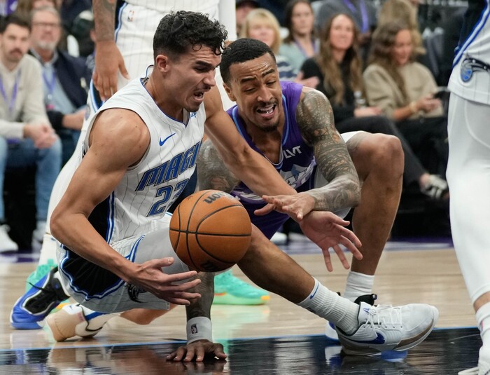 (Francisco Kjolseth  | The Salt Lake Tribune) Orlando Magic forward Tristan da Silva (23) and Utah Jazz forward John Collins (20) scramble for a loose ball as the Utah Jazz host the Orlando Magic during NBA basketball at the Delta Center in Salt Lake City on Saturday, February. 1, 2025.